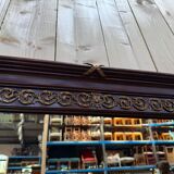 Louis XVI style mirror in mahogany and gold.