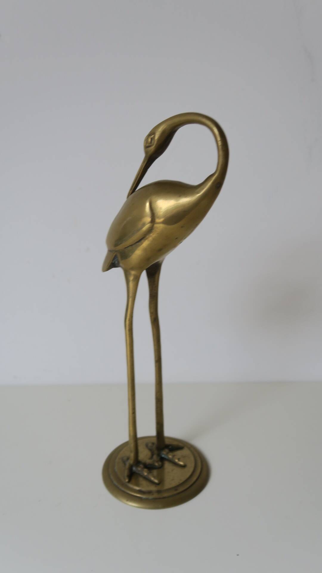 The decorative brass bird