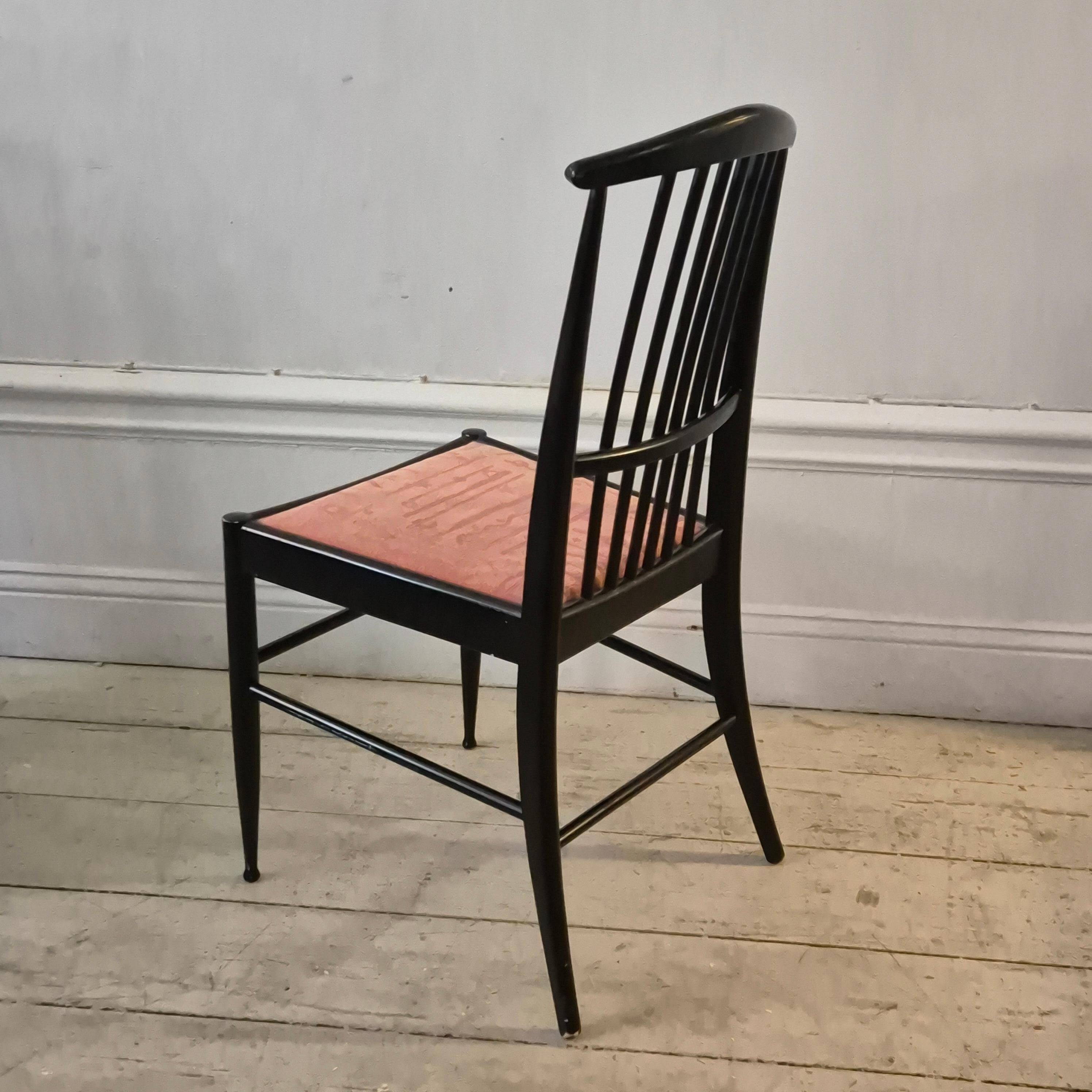 The Modernity, set of six chairs, model Charlotte, black lacquered wood.