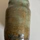Turquoise and gilded earthenware potter's vase