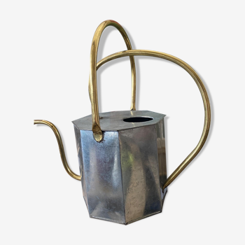 Watering can made of galvanized sheet metal and golden brass
