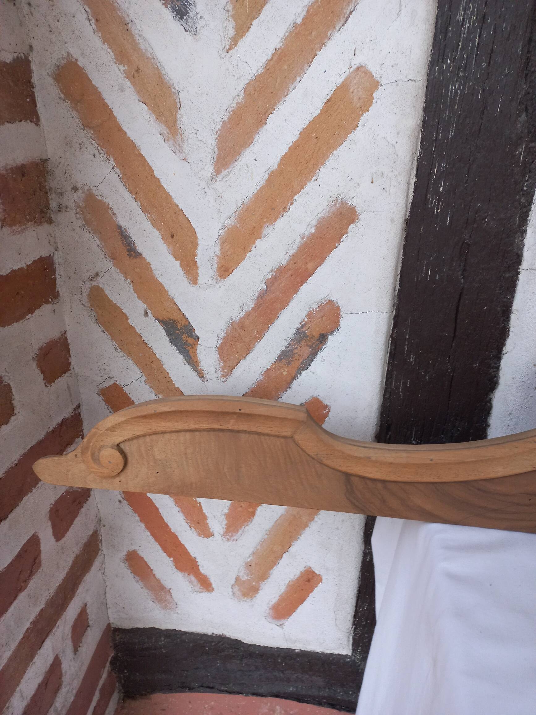 Old sandblasted wooden pediment