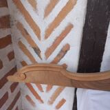 Old sandblasted wooden pediment