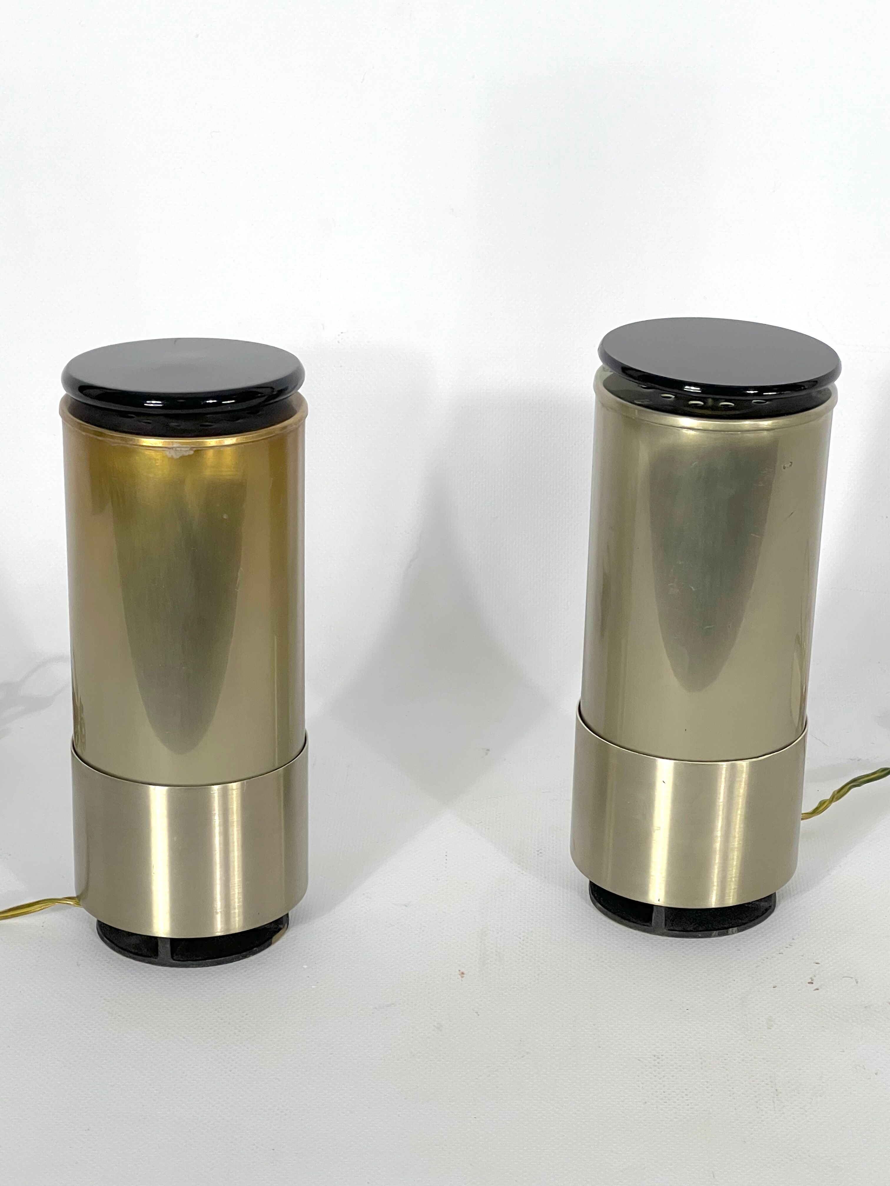 Mid-century modern pair of rare labeled Lumi Milano table lamps