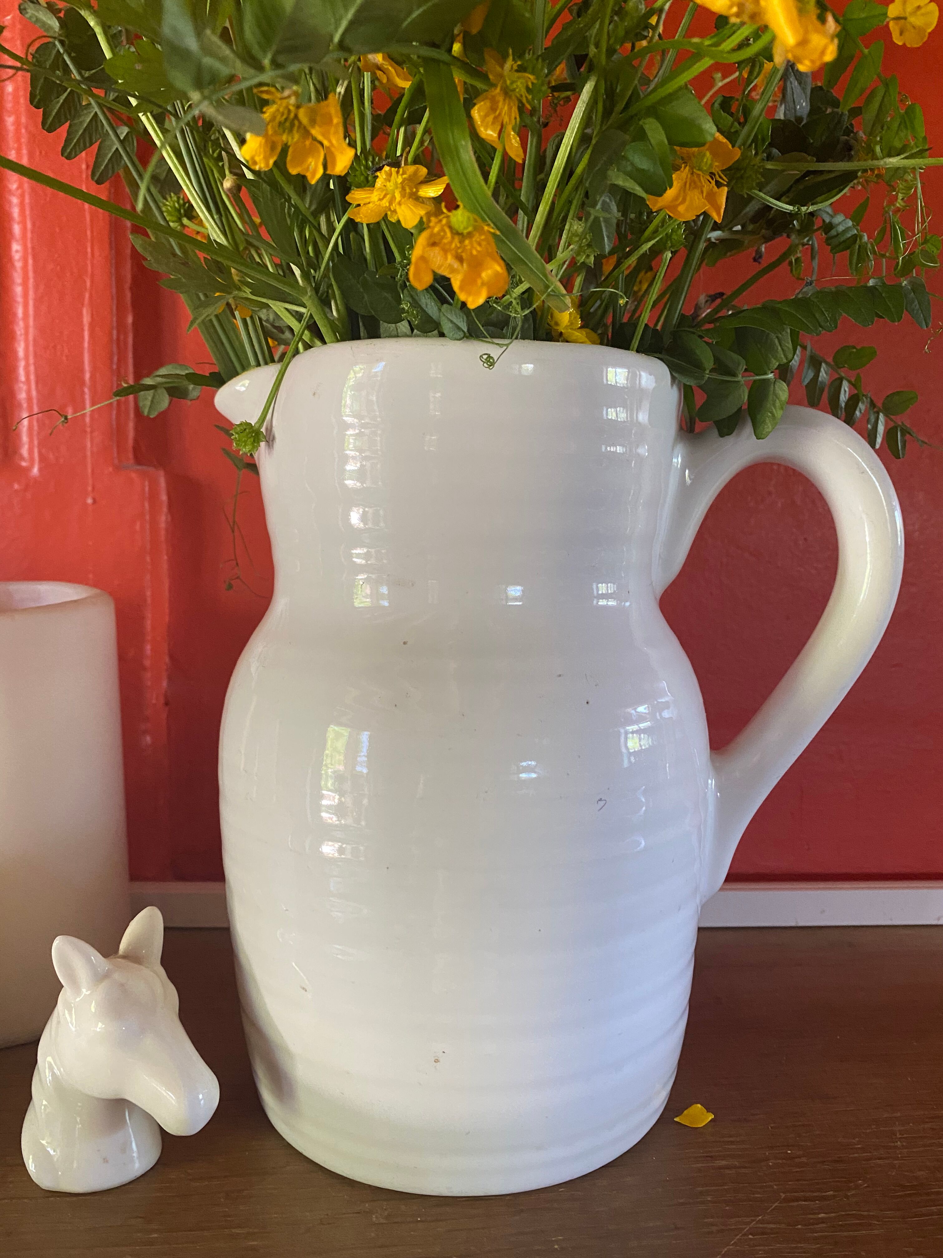 Large white ceramic pitcher