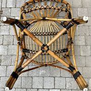Fauteuil vintage en rotin type paon – années 70