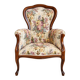 Louis XV style armchair with floral jacquard upholstery.