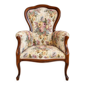 Louis XV style armchair with floral jacquard upholstery.