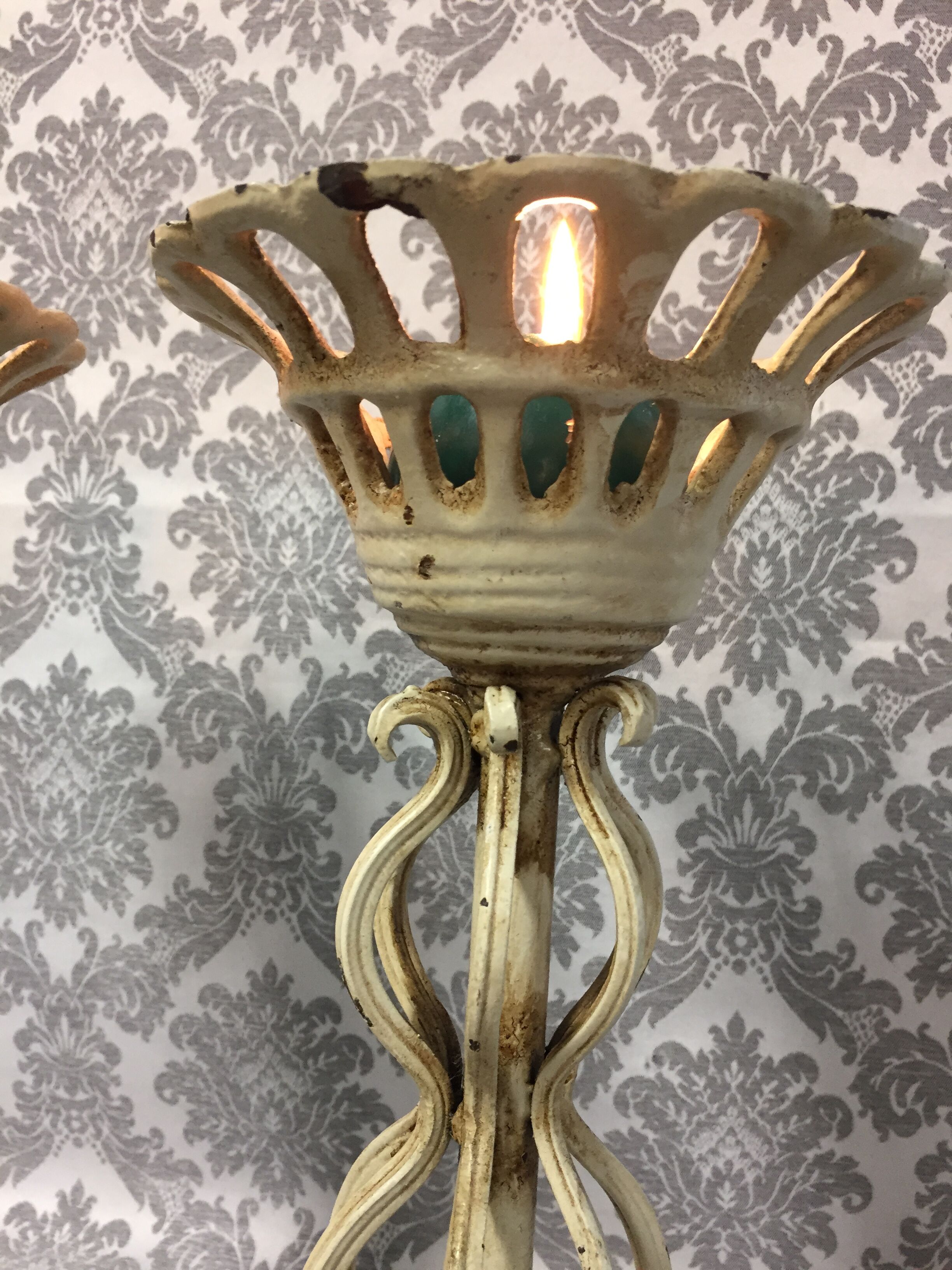 Pair of candlesticks patinated cast iron renaissance design