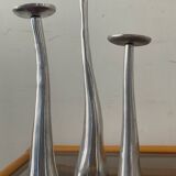Trio of vintage cast aluminum candlesticks