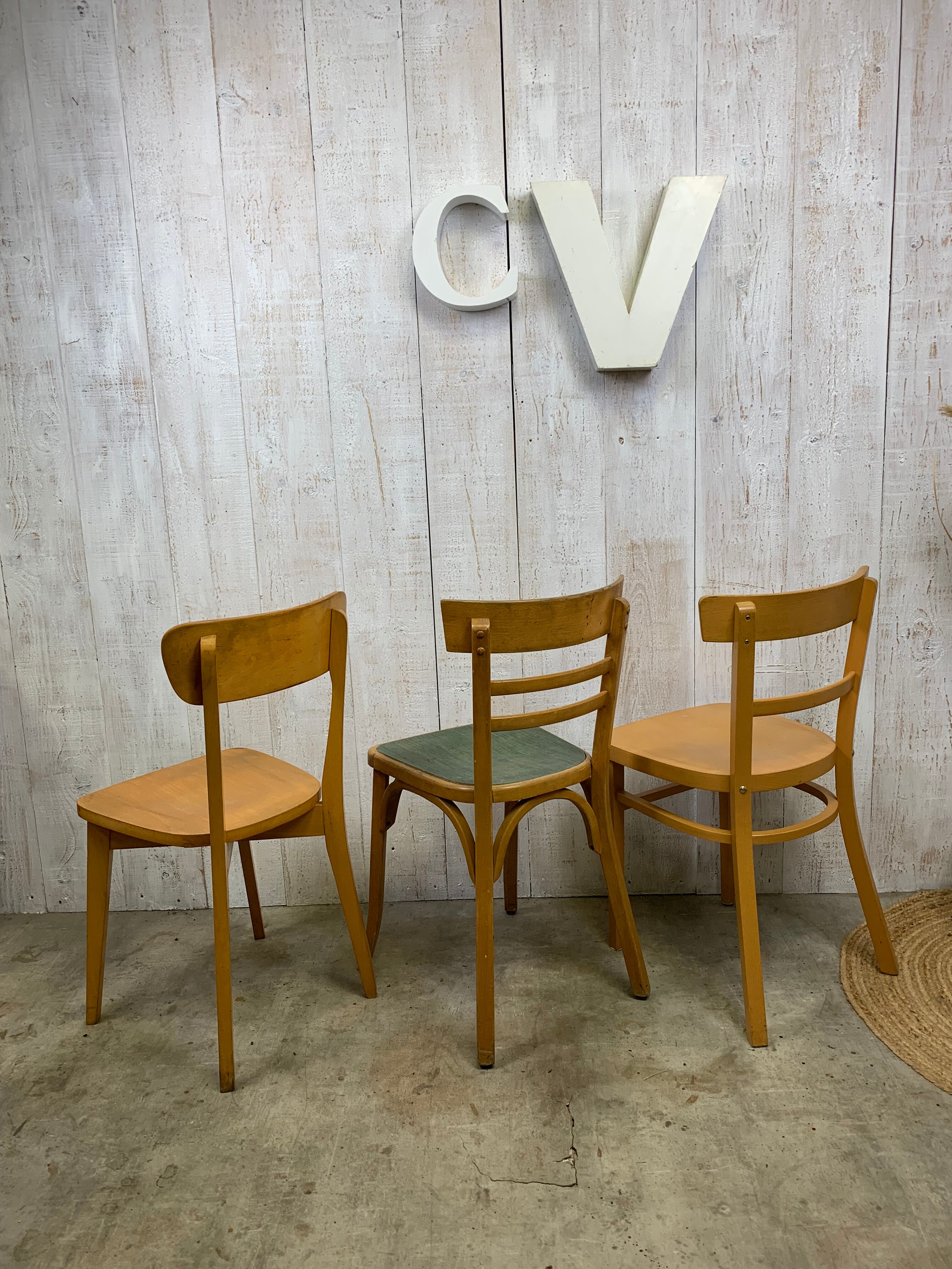 Lot 3 mismatched bistro chairs