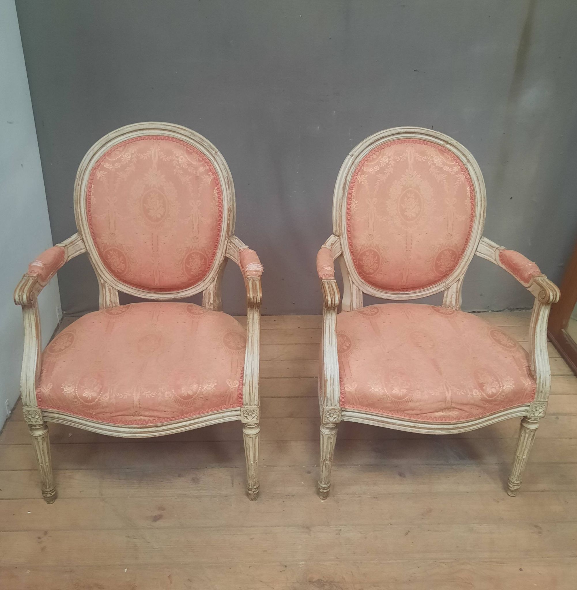Pair of Louis XVI style medallion armchairs