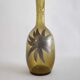 50-year-old soliflora vase in green bulled glass and pewter flower