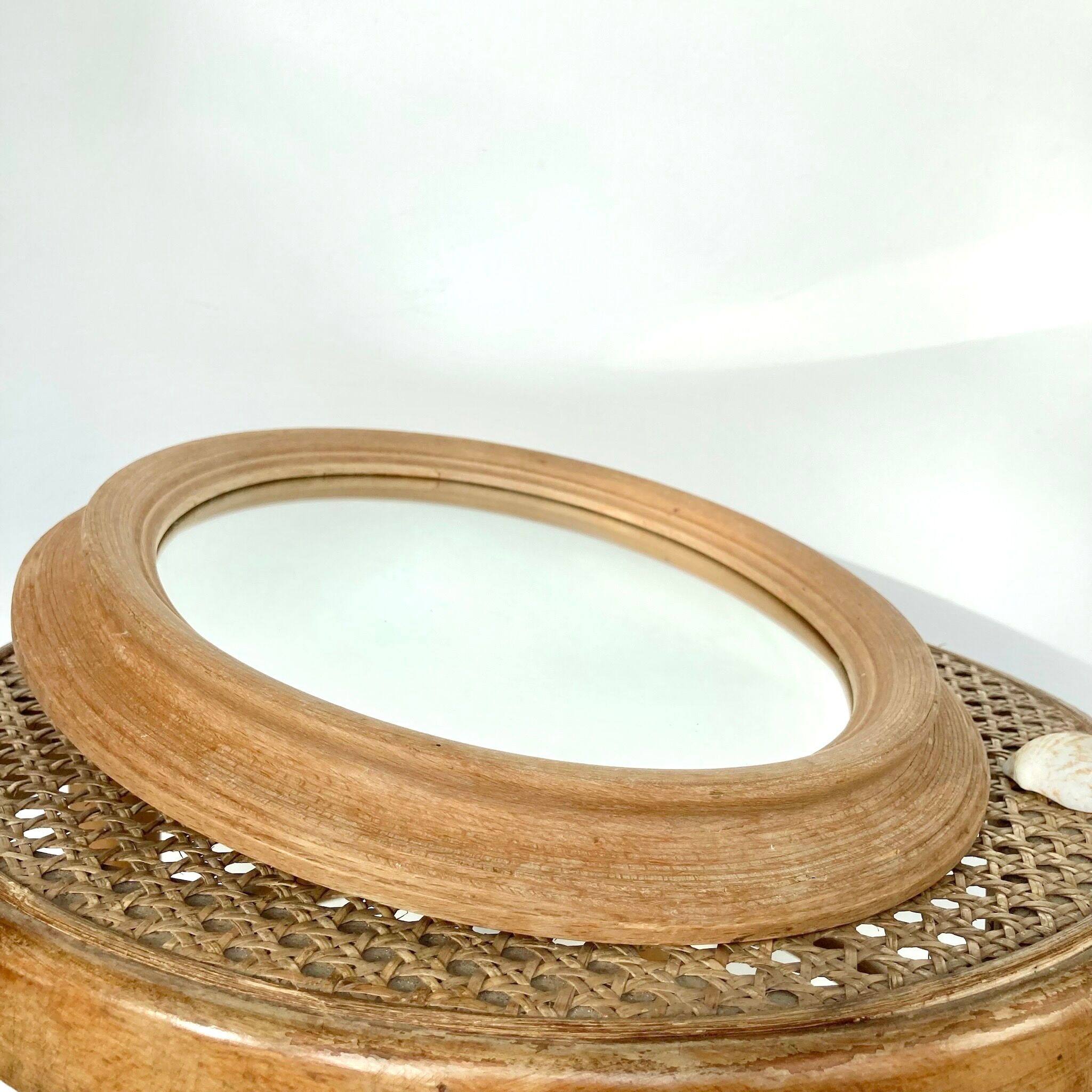 Oval wooden mirror 31x37cm