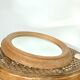 Oval wooden mirror 31x37cm