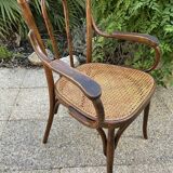 Baumann curved caned wood armchair, 1900