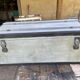 Restored wooden trunk patinated grey
