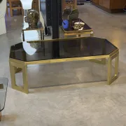 Octagonal brass coffee table, signed Anna Nora.