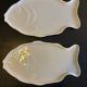 two Revol fish dishes