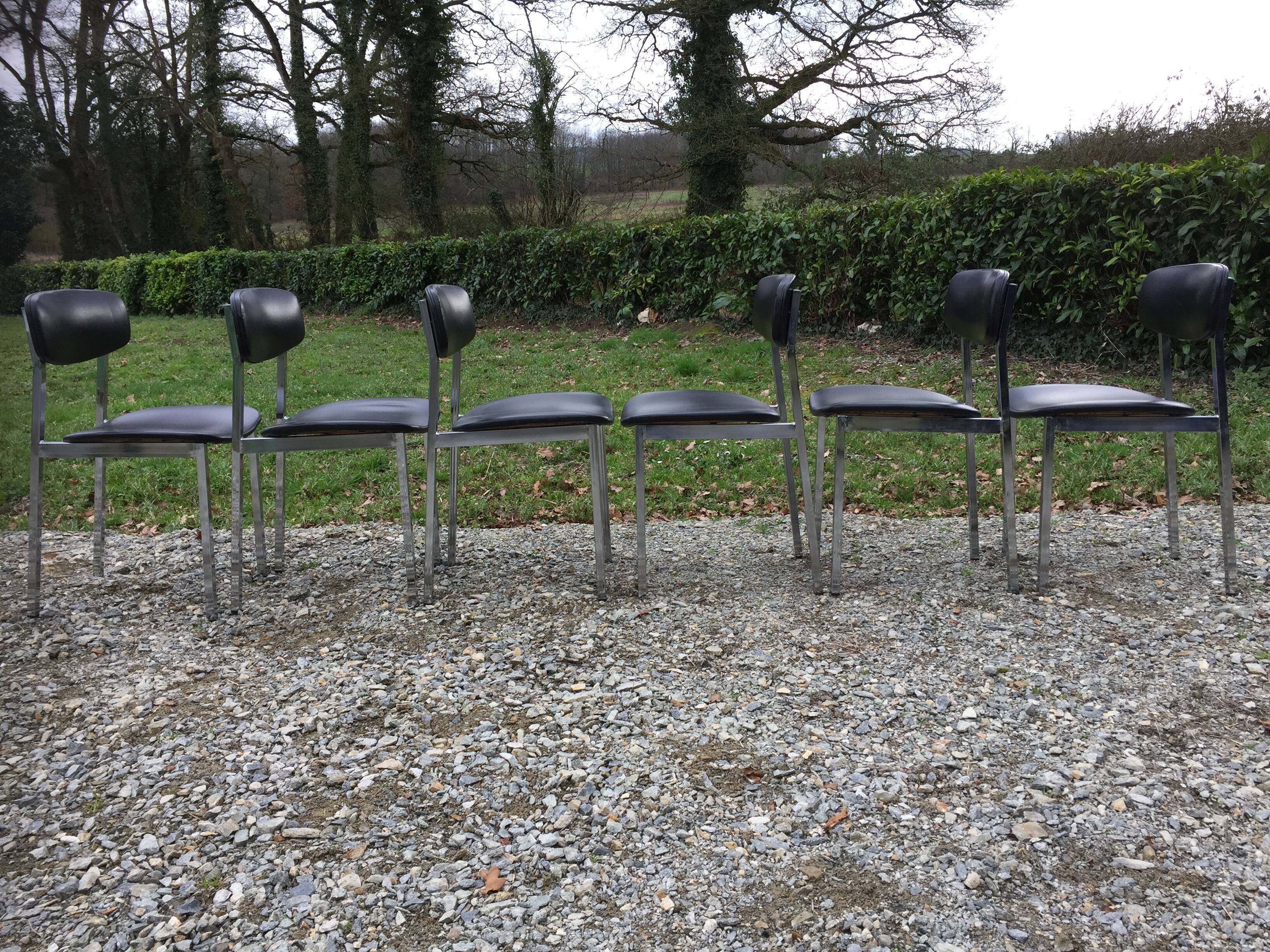 6 vintage chairs in black skaï with chrome metal tubular base.