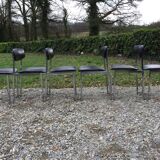 6 vintage chairs in black skaï with chrome metal tubular base.