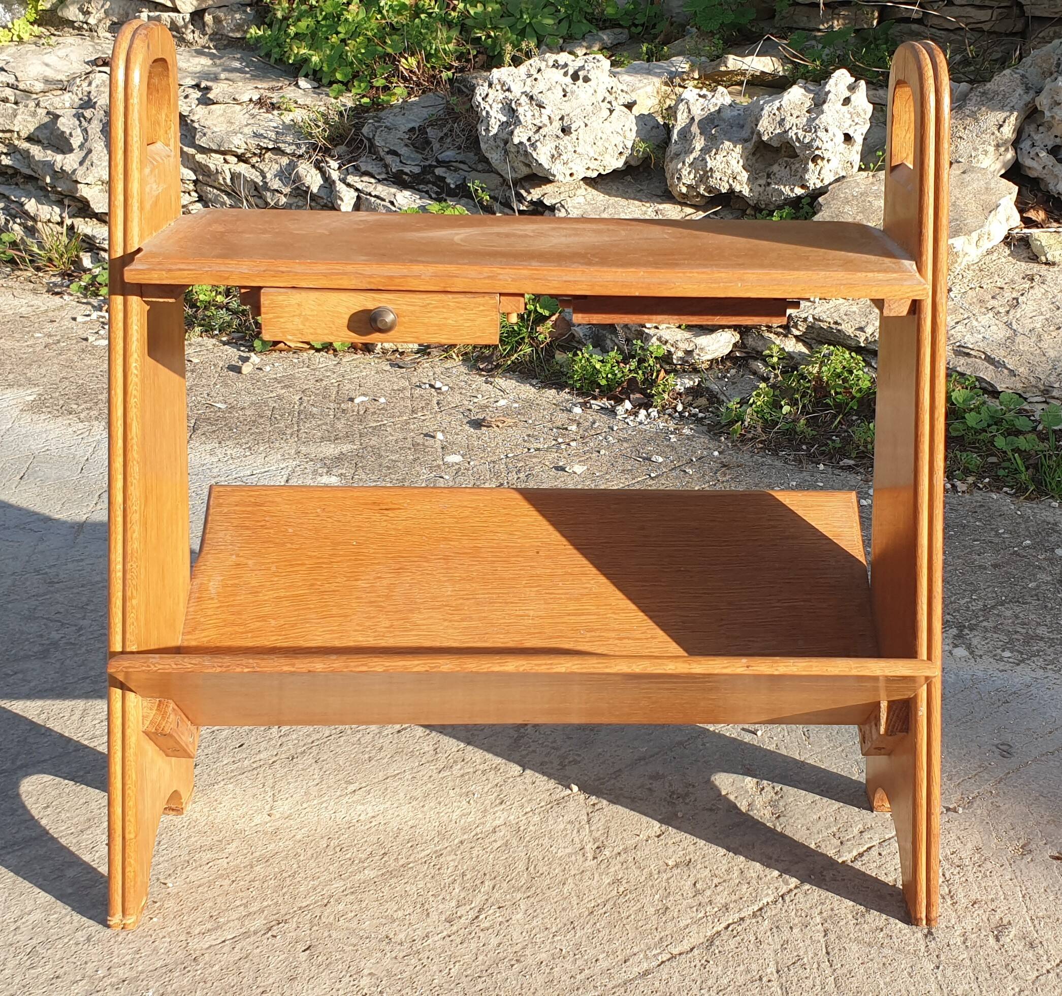 Magazine rack with sliding drawers in light wood, Scandinavian style.