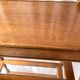 Classic wooden shelves, glass tops and cannage