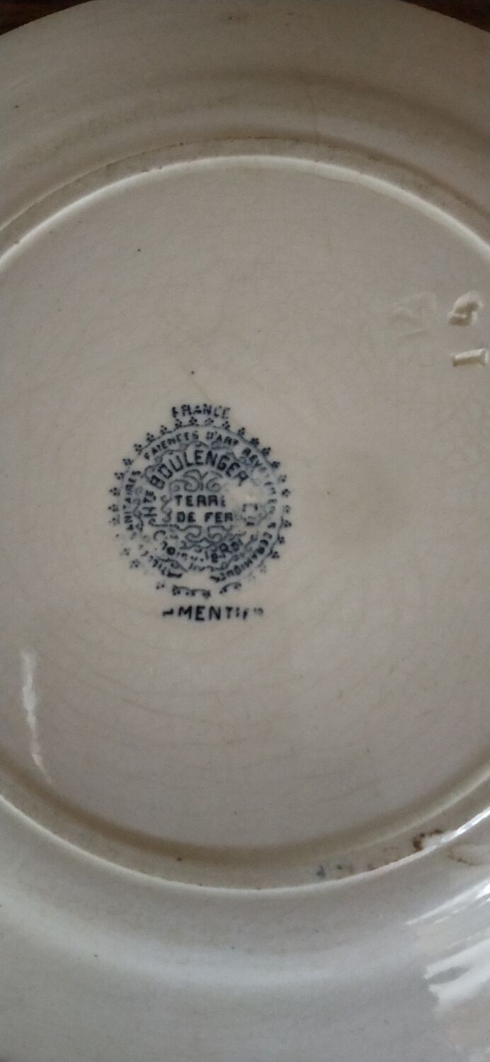 Set of two Terre de fer Parmentier hollow plates