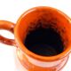 Orange ceramic pitcher