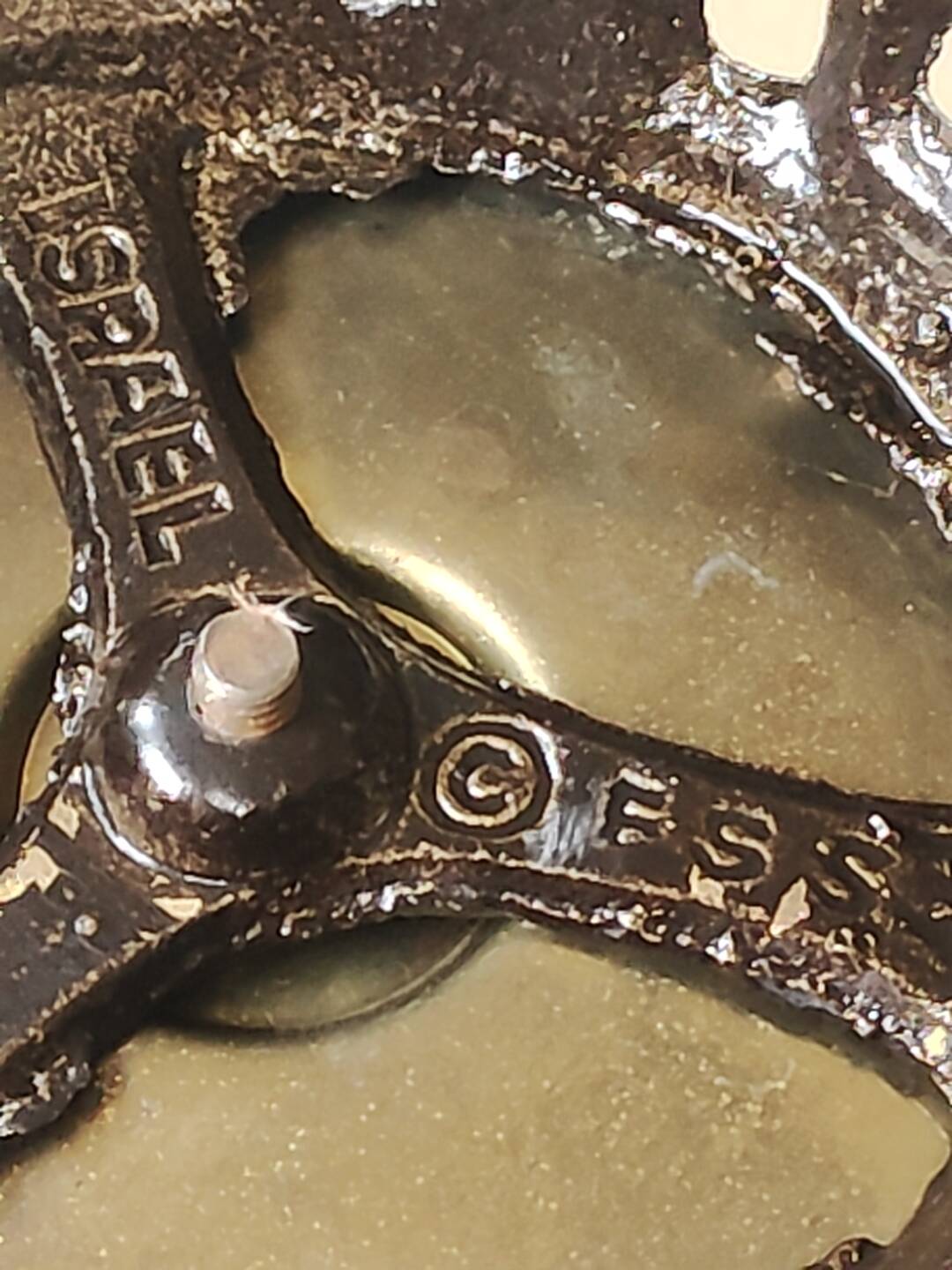 Pair of Hebrew Candlesticks. In antique gold-plated brass. Signed FFS Israel