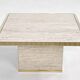 Square coffee table from the 70s in travertine and brass.