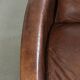 Cow leather armchair in Aviator design with patina and a warm appearance