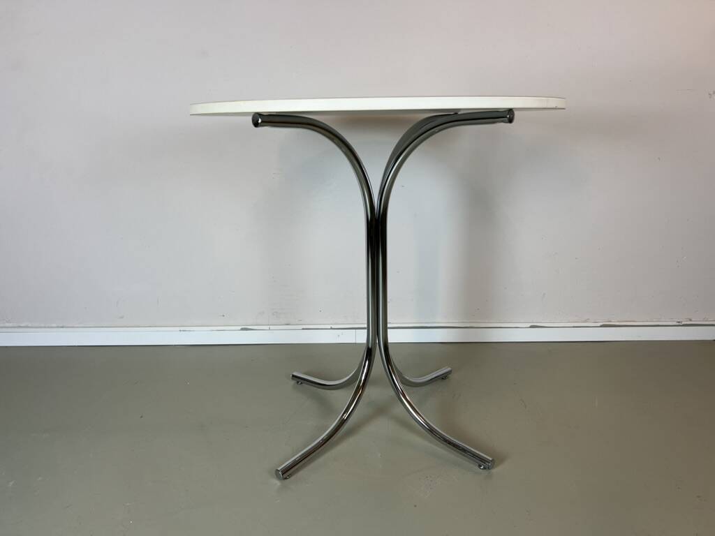 Vintage round white chrome dining table from the 70s.