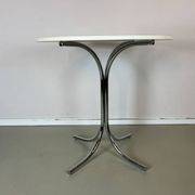 Vintage round white chrome dining table from the 70s.