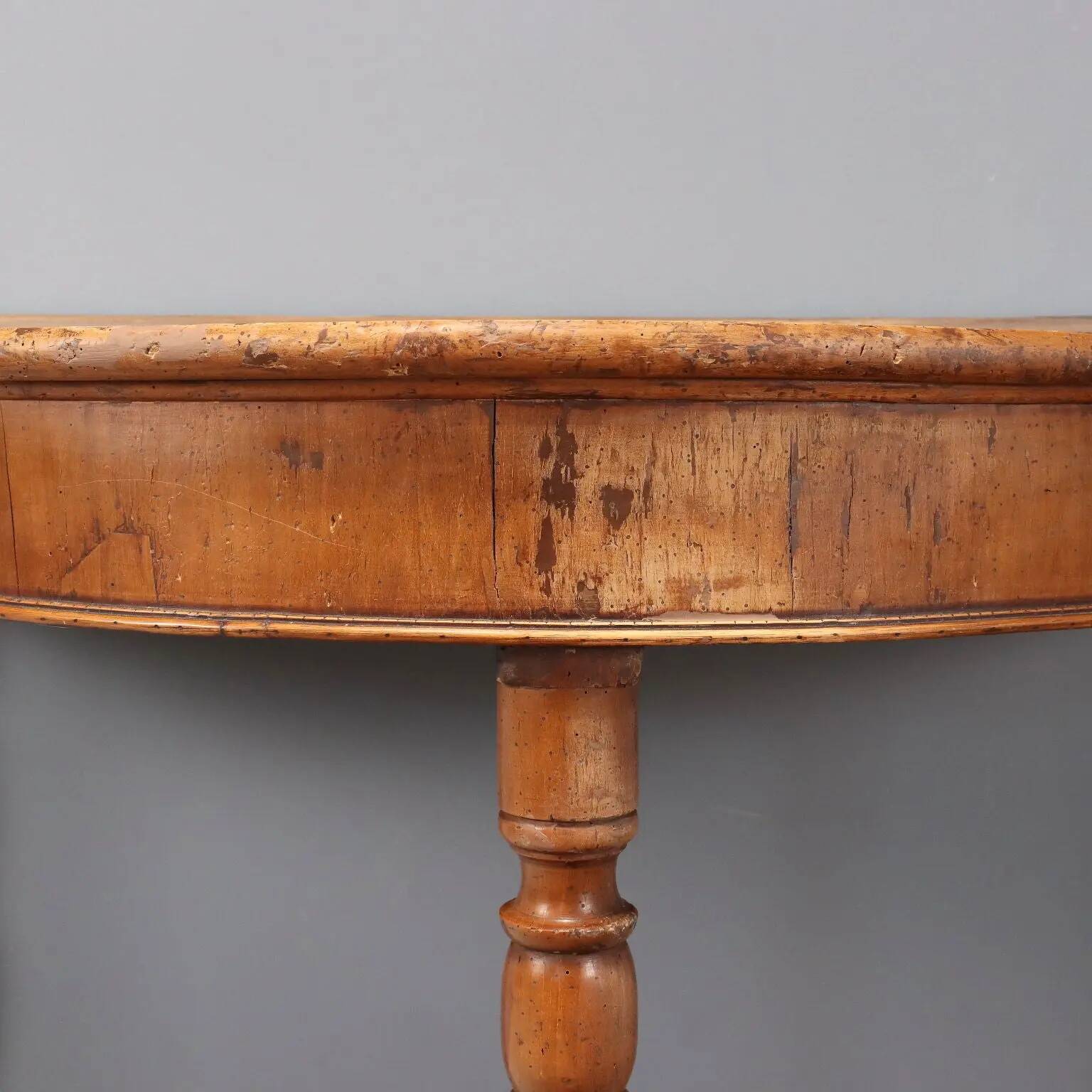 Antique walnut console with a half-moon top, Italy, 19th century.