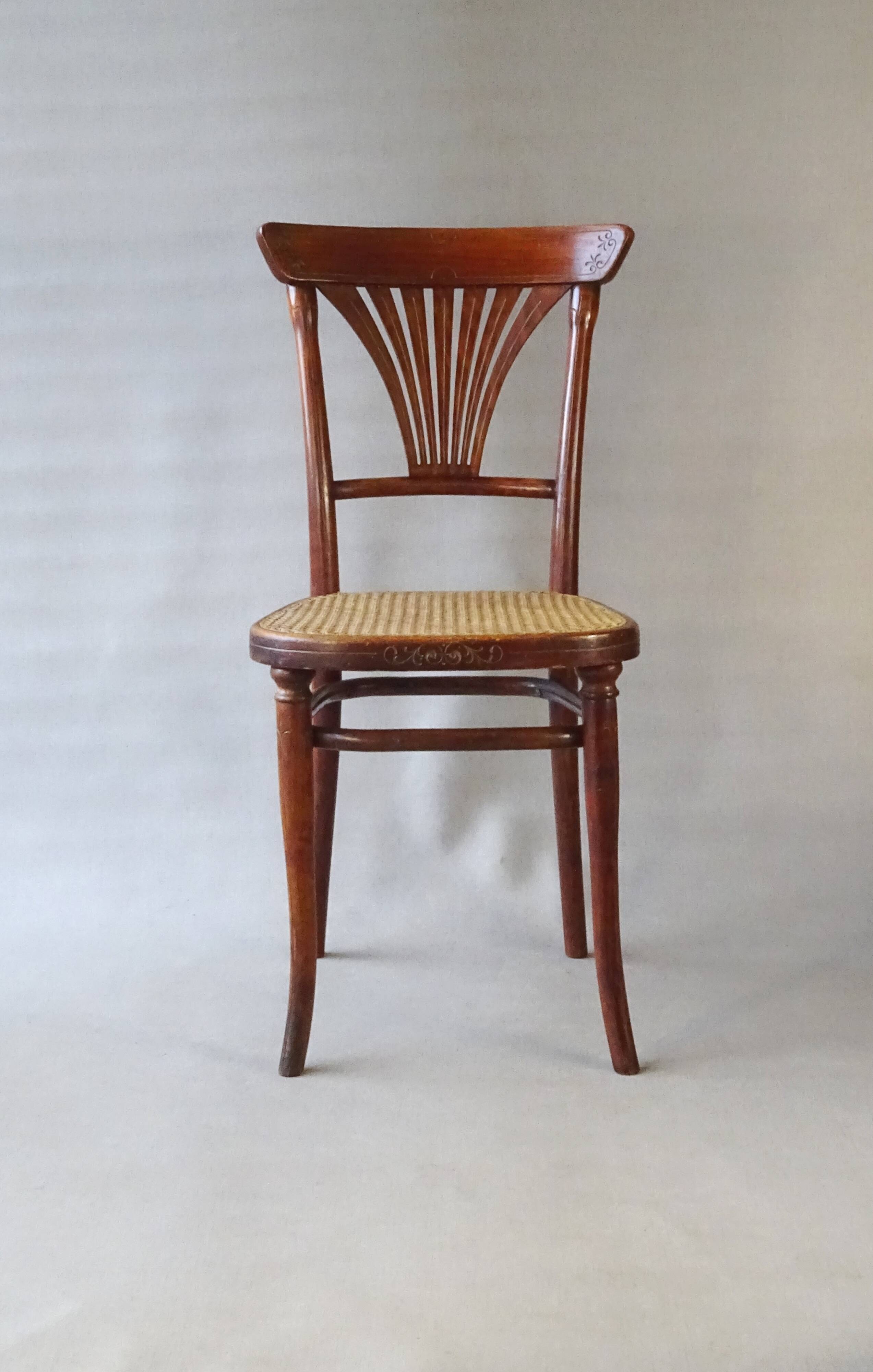 2 Thonet N°221 chairs, caned Art Nouveau bronze decor