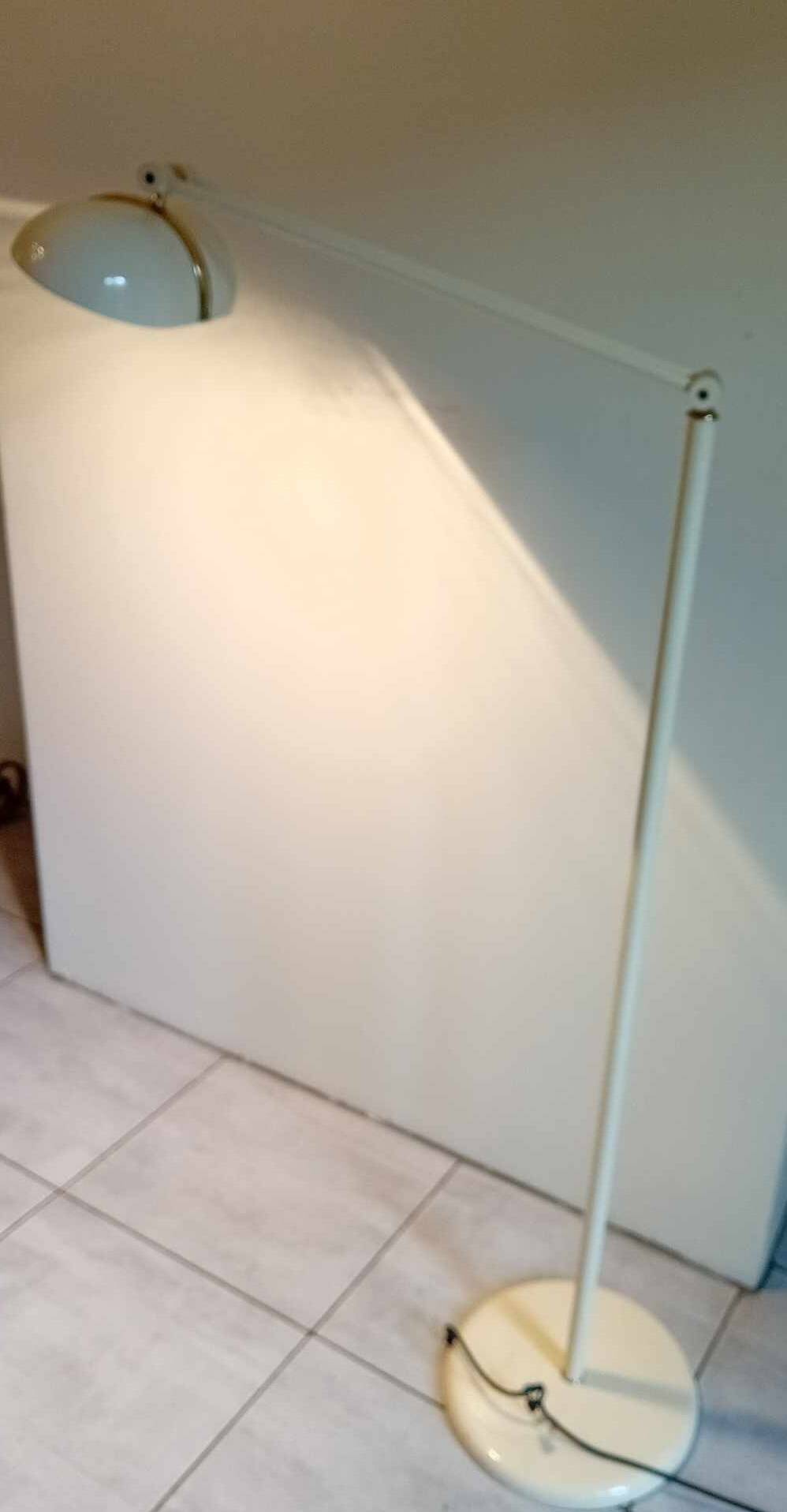 Italian floor lamp from the 70s, “Fresh Butter” color, “Made In Italy” label.