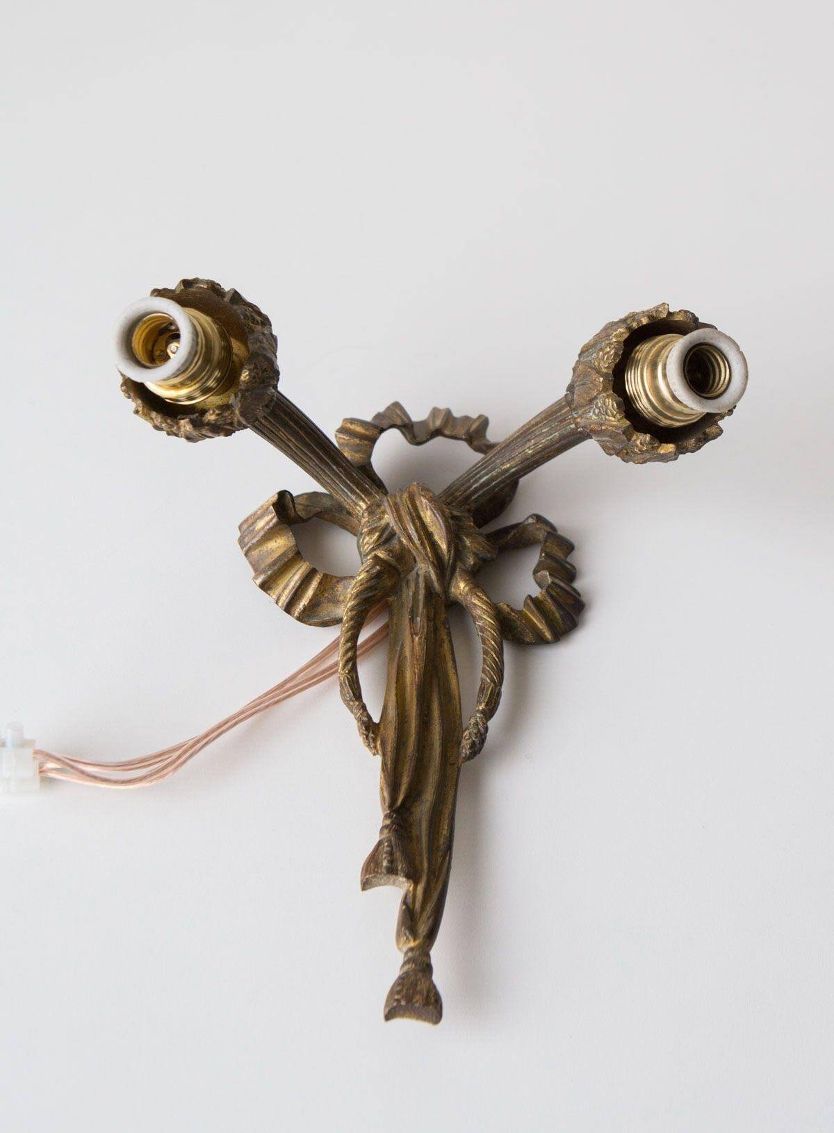 Pair of old French bronze wall lights from the beginning of the 20th century.