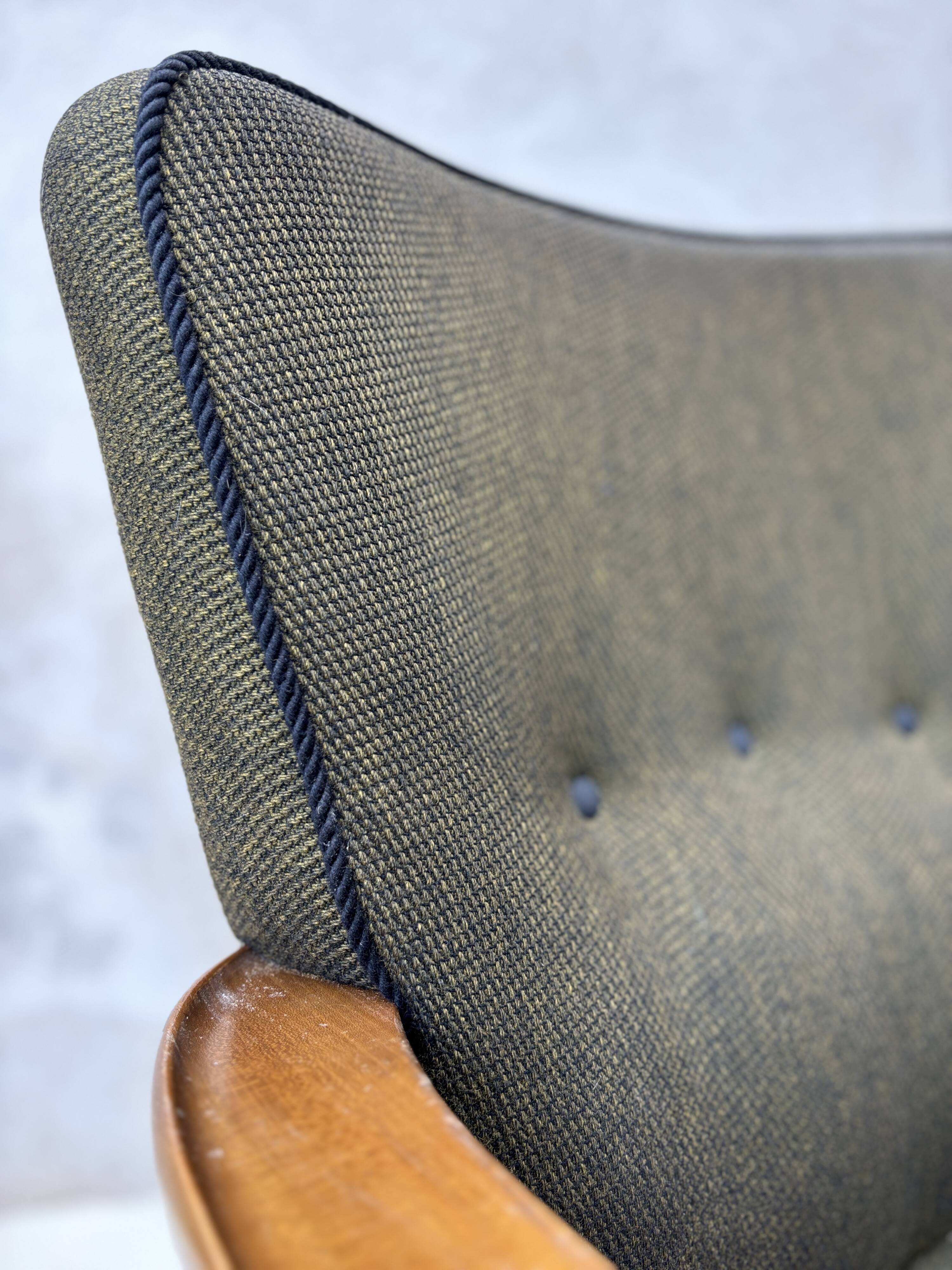 Pair of vintage wooden and fabric armchairs from the 1960s.