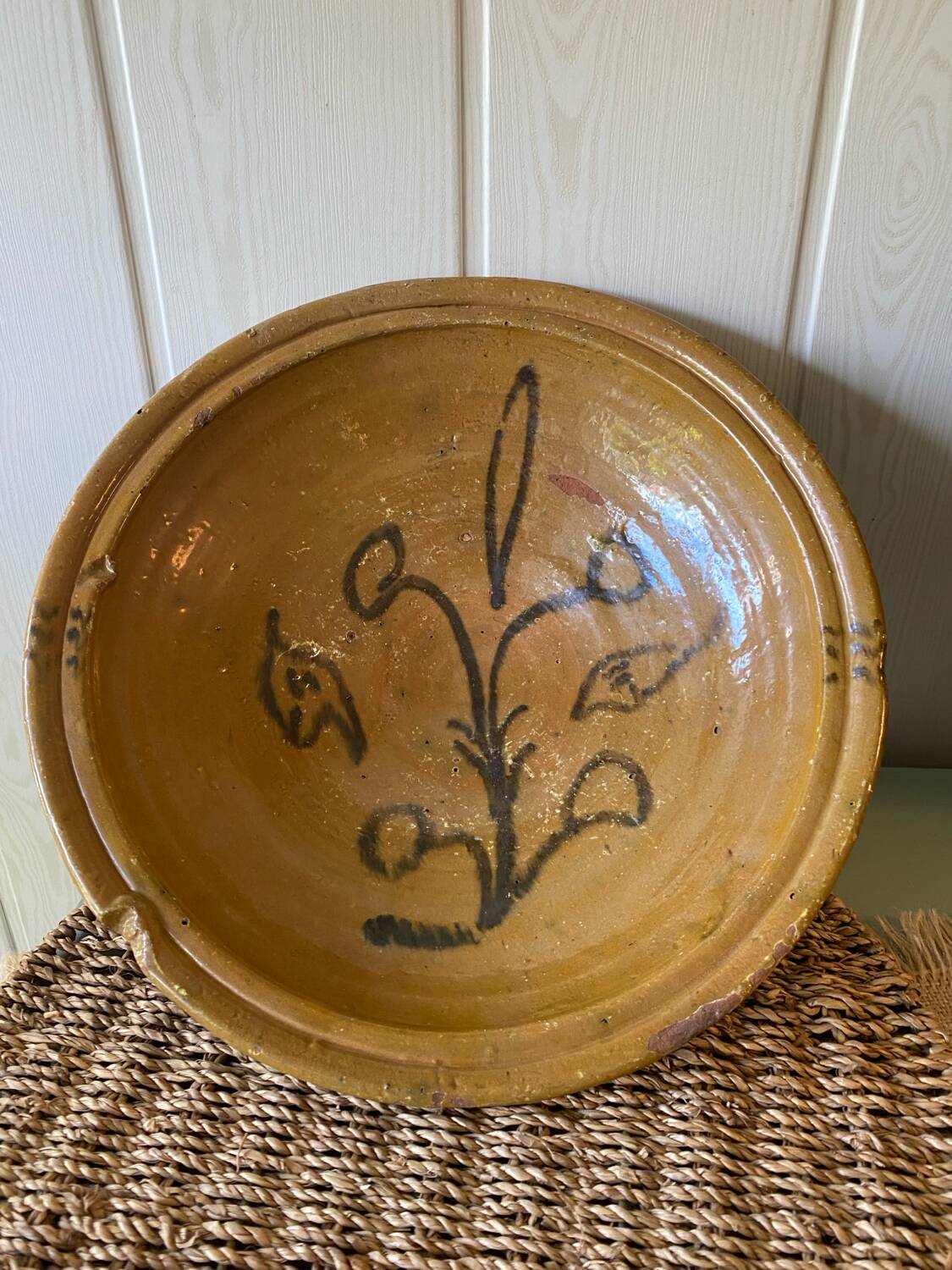 Old glazed terracotta dish