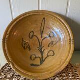 Old glazed terracotta dish