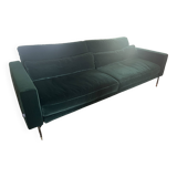 Dark green velvet sofa