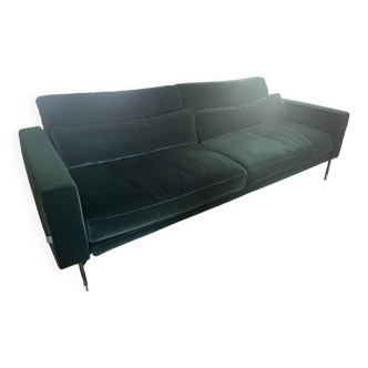 Dark green velvet sofa