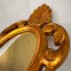 Miroir vintage en bois doré