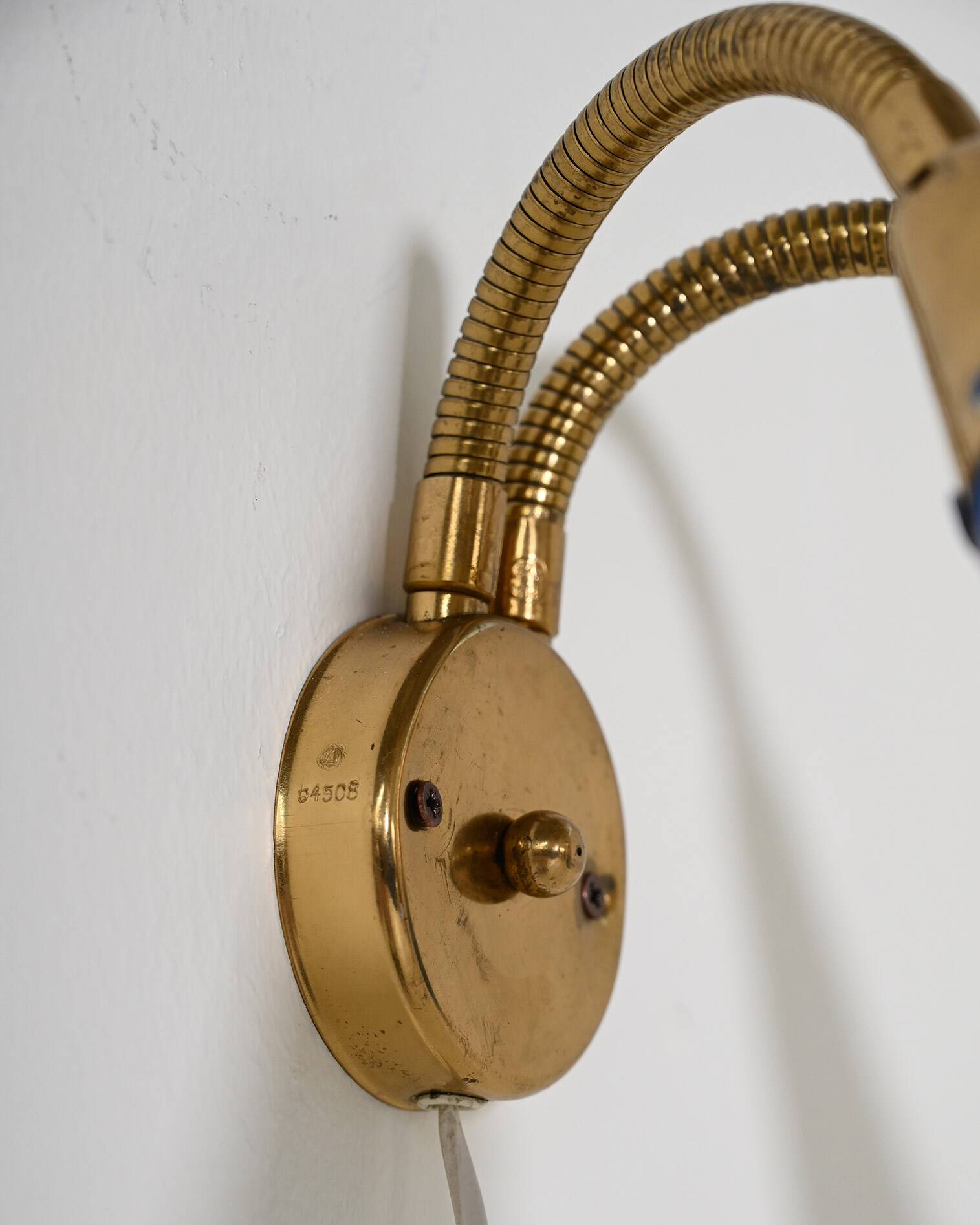 Adjustable brass and lacquered metal wall lamp, Scandinavia, 1960s