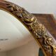Miroir en bois et plâtre, décor fleuri, Art Déco
