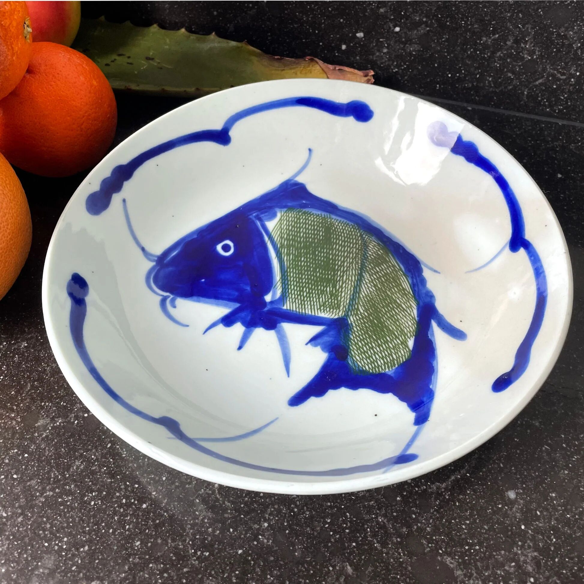 Hand-painted Chinese porcelain bowl with blue fish