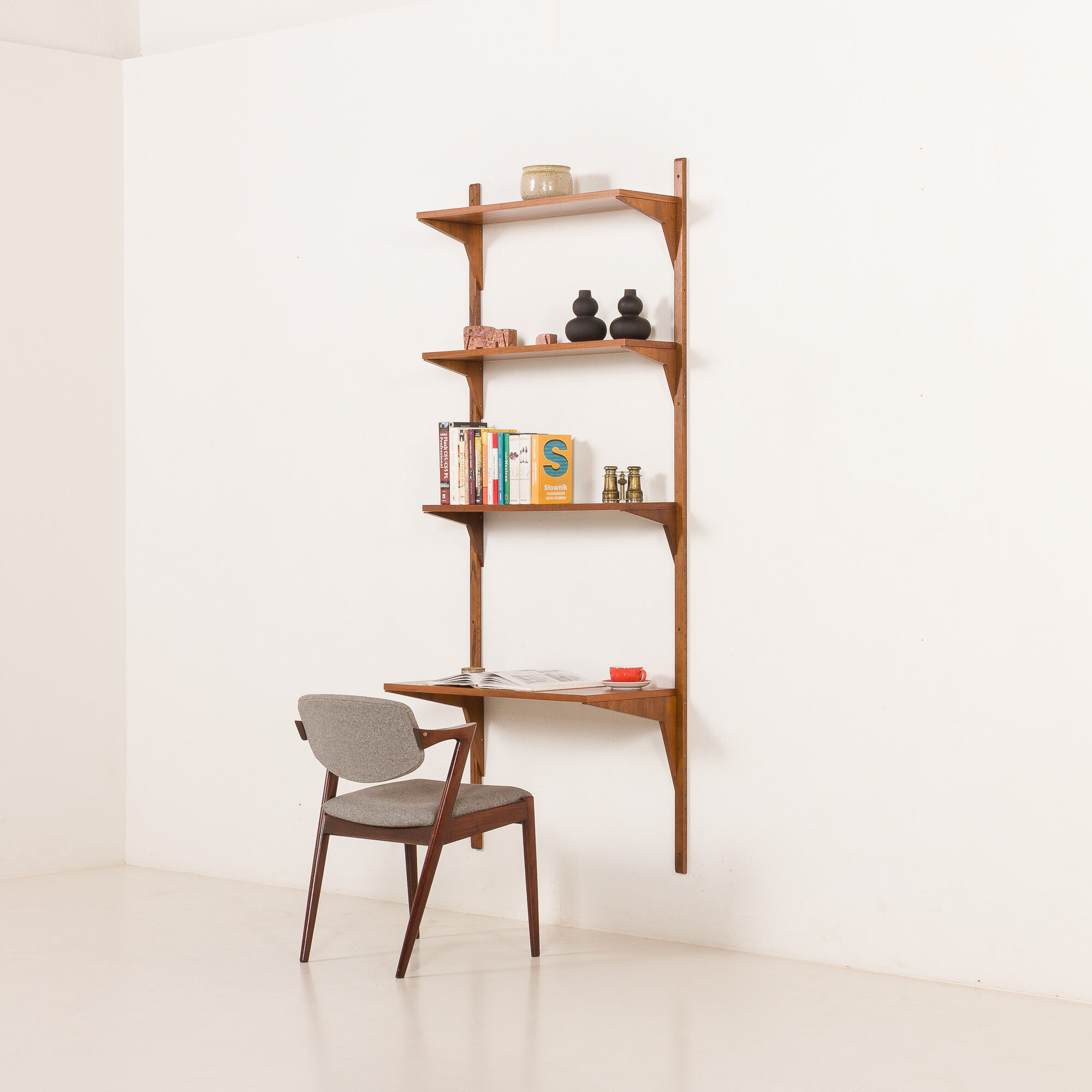 Danish mid-century walnut shelving unit in the style of Poul Cadovius, 1960s