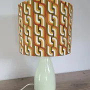 Seventies spirit lamp with geometric orange/green lampshade.