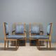 Chairs and antique armchairs in neoclassical style from the 19th century.